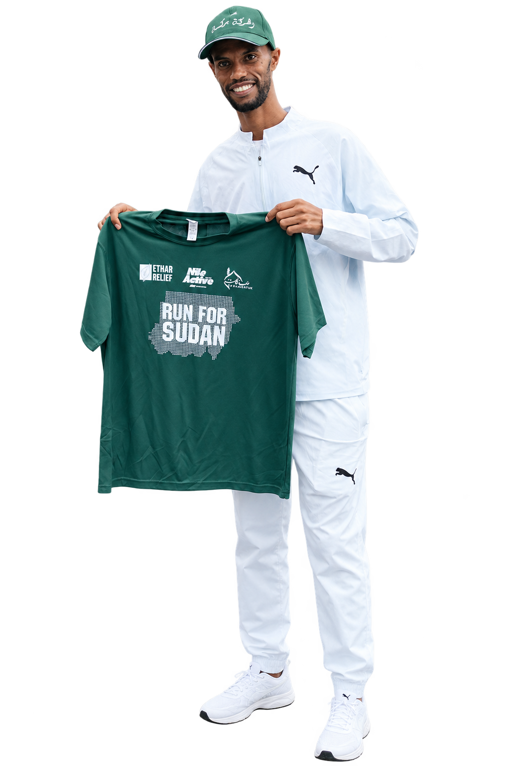 Mahamed holding the Run for Sudan shirt